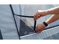 Mosquito net window with external zipped foil features in both side panels
